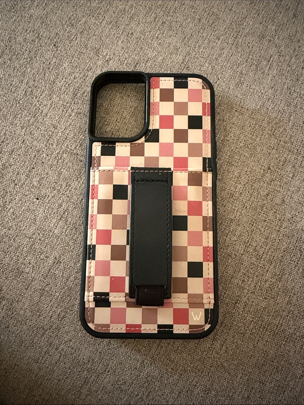Checkered Grip iPhone 16 Plus Case with Built-In Hand Strap — Pink & Black
